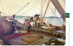Foredeck cabin visible on the ship, right - note the anchor winch over the top (black) Foredeck cabin visible on the ship, right - note the anchor winch over the top (black)